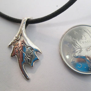 Engraved Caribou ‘Shovel’ pendant